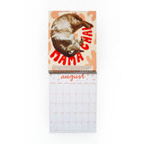 wall calendar open to August 2025